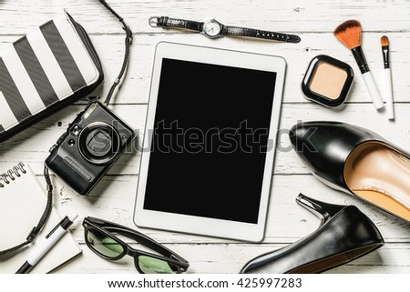 Overhead view of essential items for business women, Top view of Tablet and female accessories