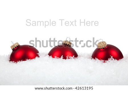 Red Christmas ornaments/baubles on a white background with copy space