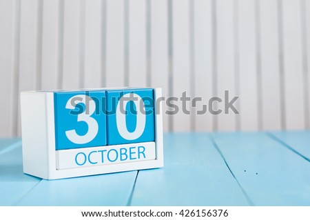 October 30th. Image of October 30 wooden color calendar on white background. Autumn day. Empty space for text
