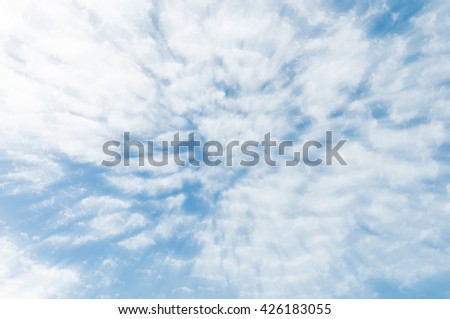 blue sky with clouds on sunshine day,effect radial blur, zoom effect