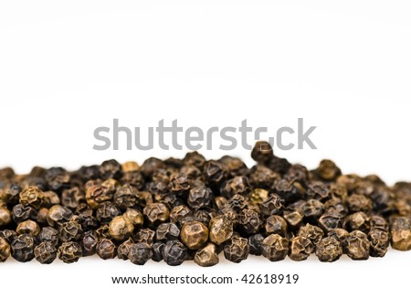 Closeup of black pepper isolated on white Royalty-Free Stock Photo #42618919