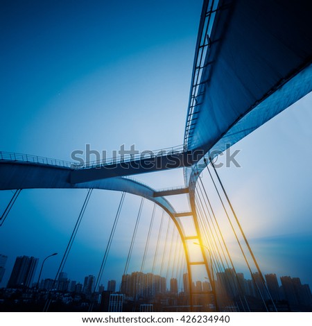 low angle view yangtse river bridge structure,chongqing china,blue toned image. Royalty-Free Stock Photo #426234940
