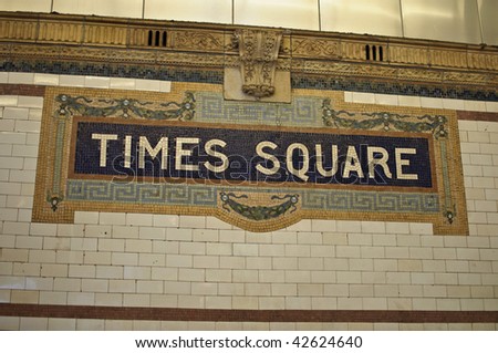 photo vintage new york city times square subway sign on entrance to subway in new york city times square. beautiful tiled new york city times square subway sign.