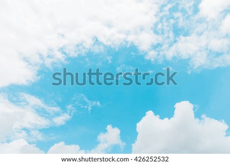 Fluffy clouds and blue sky abstract background.
