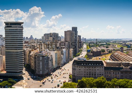 Urban panoramic view of traffic in modern summer downtown with skycrapers in the city of Buenos Aires, Argentina