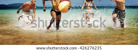 People Friendship Play Beach Ball Summer Holiday Concept