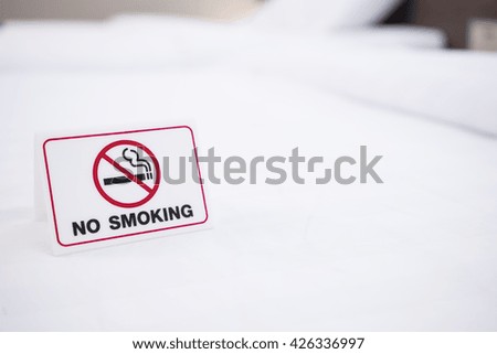 No smoking sign in bedroom