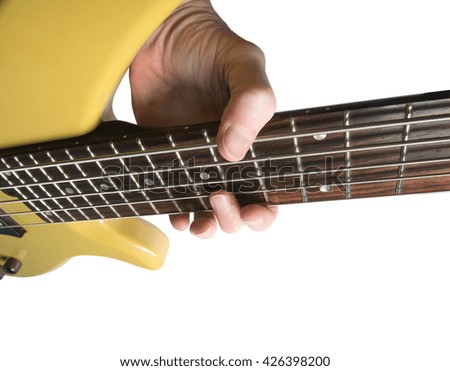  guitar with musician's hand isolated on white background.