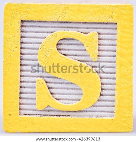 Letter S old wooden painted block