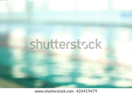 Defocused background of swimming pool indoors Royalty-Free Stock Photo #426419479