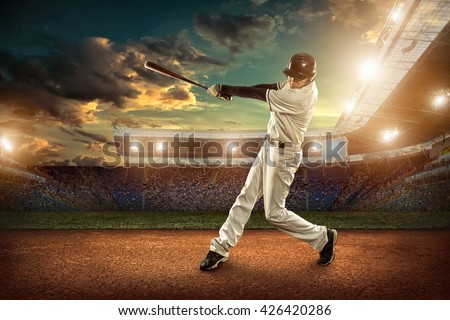 Baseball players in action on the stadium. Royalty-Free Stock Photo #426420286
