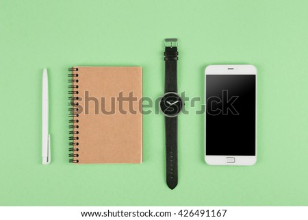 Music online concept - phablet and headphones on the wooden desk