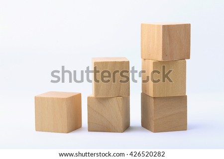 Wooden blocks are isolated on white background. Royalty-Free Stock Photo #426520282