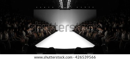 Fashion runway out of focus,blur background Royalty-Free Stock Photo #426539566