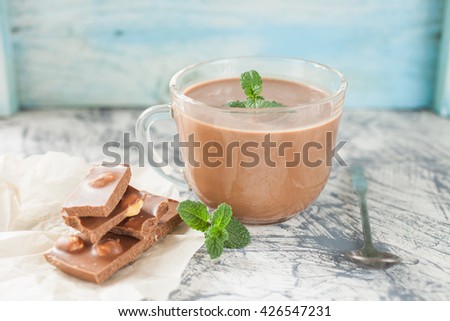 hot chocolate in a cup on a table, selective focus
