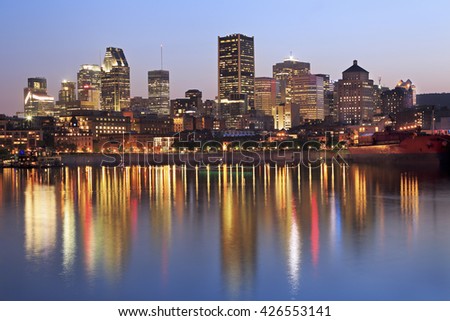 Montreal skyline at dusk and St Lawrence River, Quebec, Canada
