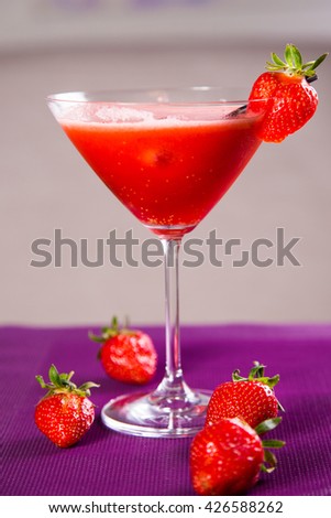 cold fresh strawberries smoothie with full strawberry in restaurant