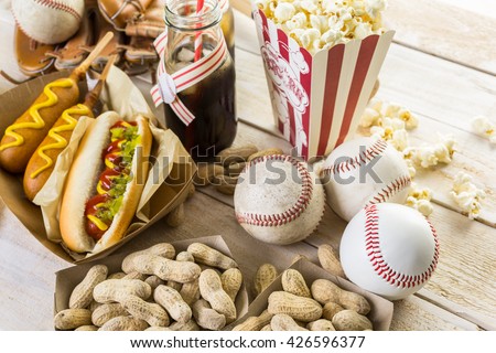 Baseball party food with balls and mizuno on a wood table.