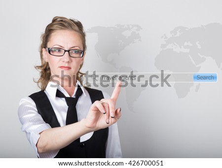 travel agents written in search bar on virtual screen. Internet technologies in business and home. woman in business suit and tie, presses a finger on a virtual screen