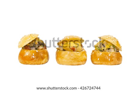 Mini sandwiches with meat cheese and vegetables