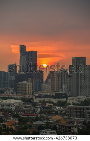 Sunset and red sun in the city skyline, Bangkok, Thailand