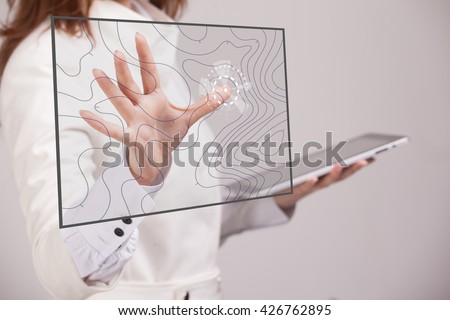 Geographic information systems concept, woman scientist working with futuristic GIS interface on a transparent screen. Royalty-Free Stock Photo #426762895