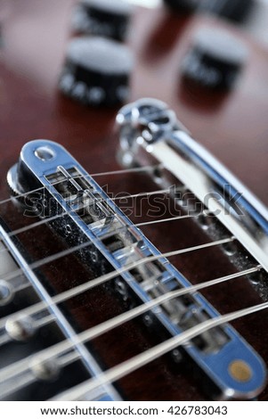 Strings of electric guitar, close up
