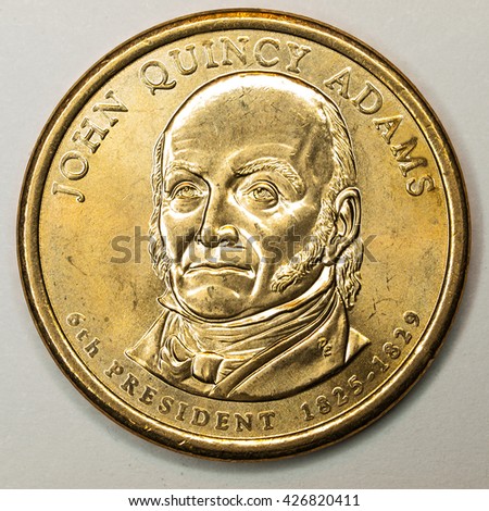US Gold Presidential Dollar Featuring John Quincy Adams Royalty-Free Stock Photo #426820411
