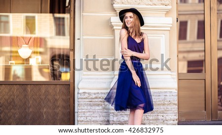 City walk - fashion street photo session of stylish young lady