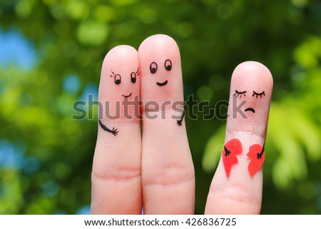 Finger art of Happy couple hugging. Other girl is holding a broken heart. Royalty-Free Stock Photo #426836725