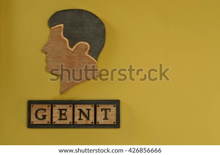 Wooden man restroom sign - yellow tone