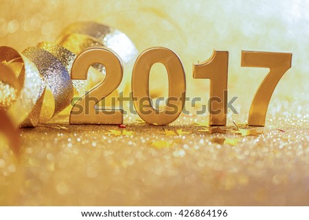 New year decoration,Closeup on golden 2017 Royalty-Free Stock Photo #426864196