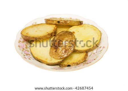 The picture shows a plate baked potatoes