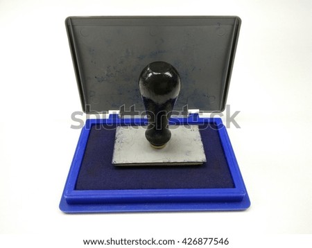 rubber stamp on blue ink/ white background
