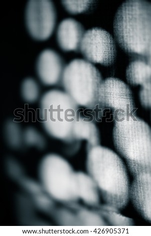 Abstract round shadow on wooden wall for background. Selective focus. Shallow depth of field. Toned.