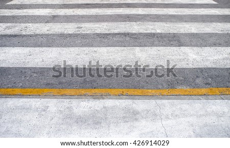 Rough cross road black white yellow line horizontal perspective texture background clear floor with soft focus
