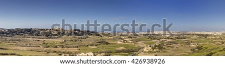 HDR panorama photo of Malta landscape from the top of the historic city Mdina on a sunny day in late afternoon sun.