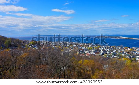 Houses and Atlantic Ocean shore at Sandy Hook with a view to NYC. View from light house. Sandy Hook is in New Jersey, USA