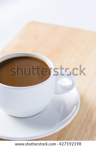 Cup of Coffee on Wooden
