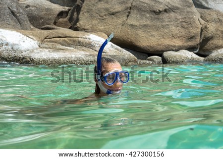 diving in Thailand, the girl in an underwater mask