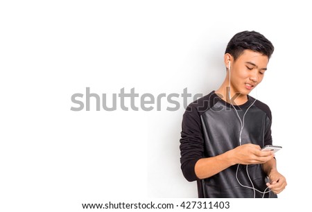 a thai boy listening to music