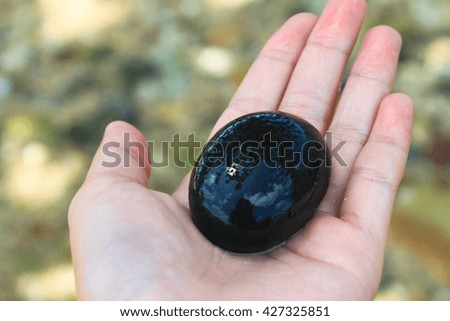 Black stones texture,sea beach