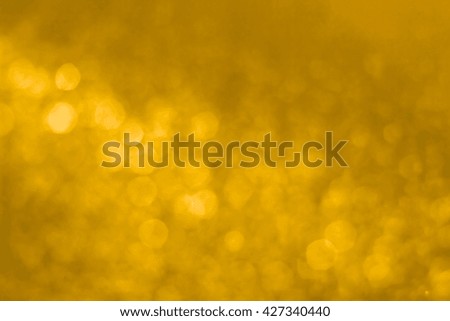 Abstract golden christmas bokeh lights background