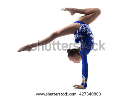 Beautiful gymnast athlete teenage girl wearing dancer blue leotard working out, dancing, doing backbend, handstand exercise, back walkover, full length, studio, white background, isolated