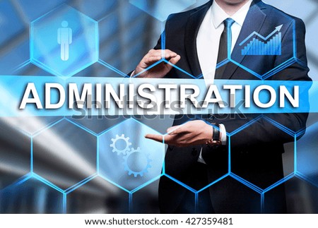 Glowing text "Administration" in the hands of a businessman. Business concept. Internet concept.