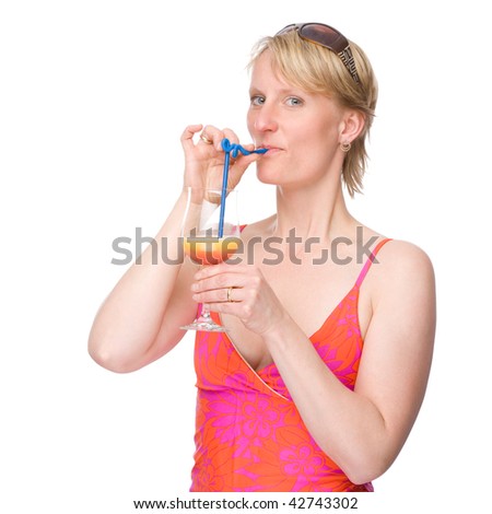 Full isolated studio picture from a young woman having a drink