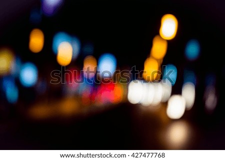 Blurred of city lights from cars and motorcycle