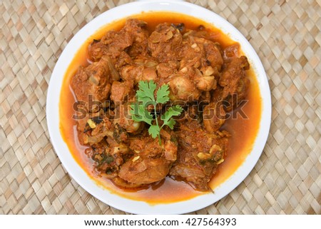 Kerala style food hot spicy red Asian chicken curry with thick gravy. famous breakfast dish . Indian food culture .