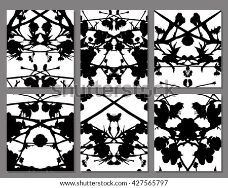 Abstract symmetrical black stains on a white background, set