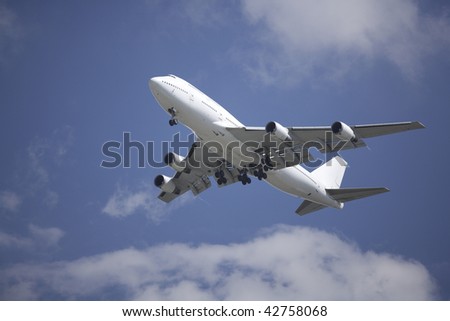 A Boeing 747 airliner coming in for landing on final approach Royalty-Free Stock Photo #42758068